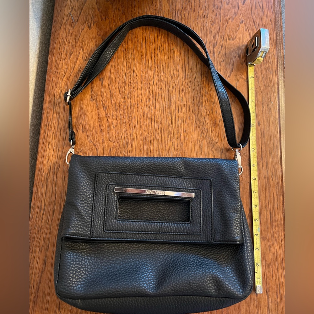 Nine West black handbag shoulder bag with adjustable strap and silver accents.